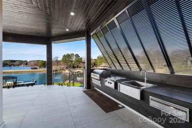 Experience the pinnacle of Lake Norman living from this