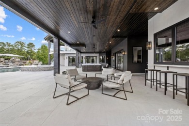 Experience the pinnacle of Lake Norman living from this