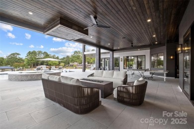 Experience the pinnacle of Lake Norman living from this