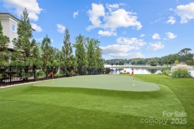 Experience the pinnacle of Lake Norman living from this