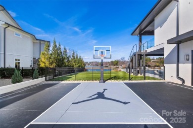 Experience the pinnacle of Lake Norman living from this