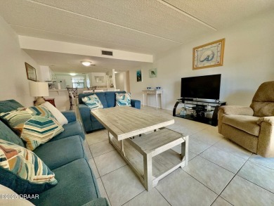 Located in desirable Daytona Beach Shores this roomy end unit