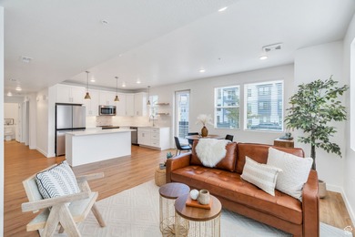 Experience this homes impeccable location in Daybreak's vibrant