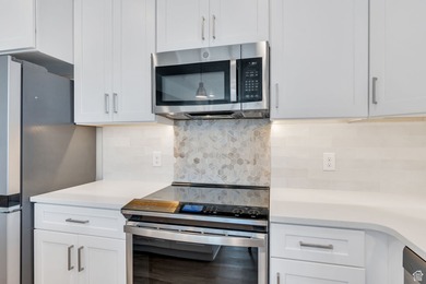 Experience this homes impeccable location in Daybreak's vibrant