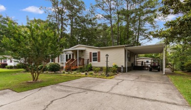 Welcome to 3093 Palmetto Drive, a beautifully updated 3-bedroom