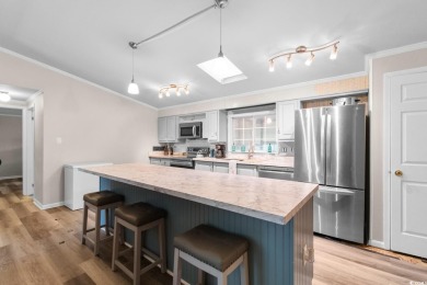 Welcome to 3093 Palmetto Drive, a beautifully updated 3-bedroom