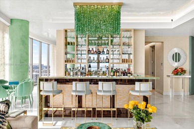 Spectacular south corner residence at The Estates at Acqualina