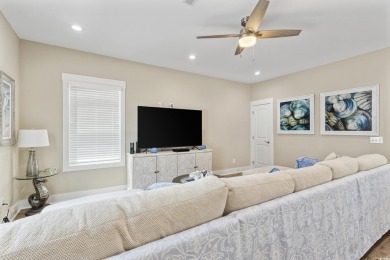 Truly stunning 3-bedroom, 2.5-bath raised beach home located in