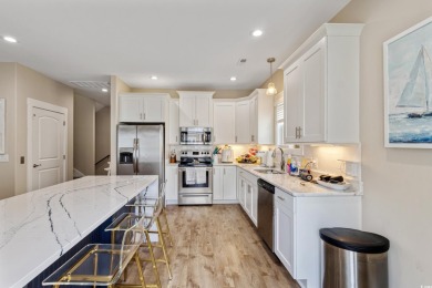 Truly stunning 3-bedroom, 2.5-bath raised beach home located in