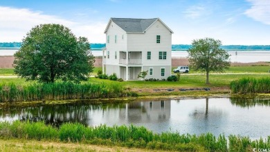 Views galore from the front porch of this newly built 4 bedroom