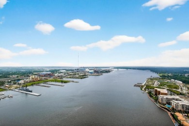 Luxury Riverfront Condominium with Stunning Views & High-End