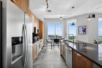 Luxury Riverfront Condominium with Stunning Views & High-End
