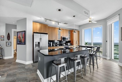 Luxury Riverfront Condominium with Stunning Views & High-End