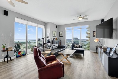 Luxury Riverfront Condominium with Stunning Views & High-End