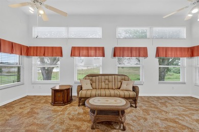 This exceptional home offers stunning views of the golf course