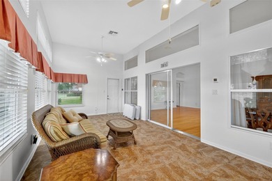 This exceptional home offers stunning views of the golf course