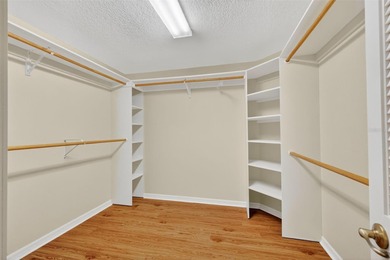 This exceptional home offers stunning views of the golf course