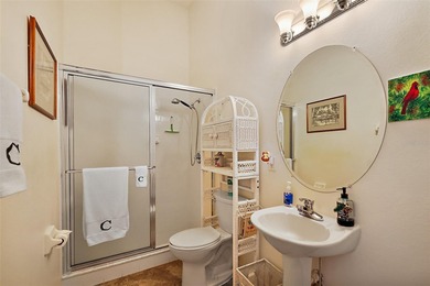 This exceptional home offers stunning views of the golf course