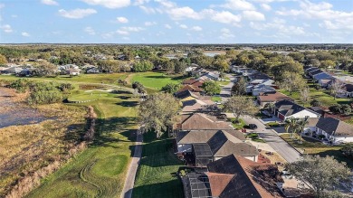 This exceptional home offers stunning views of the golf course