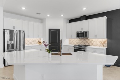 Absolutely Stunning Coach Home on Premium Peninsula Lot with