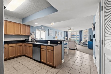 Discover your coastal oasis in this charming second-row condo