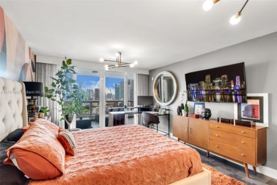 Enjoy breathtaking views of Biscayne Bay and Downtown Miami from