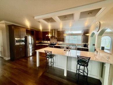 This home is located in Water Oak Country Club Estates, an