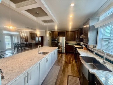 This home is located in Water Oak Country Club Estates, an