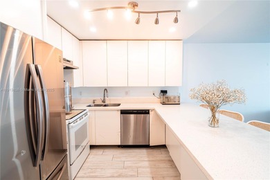 MOTIVATED SELLER! Beautifully updated high-floor 1BD/1.5BA condo
