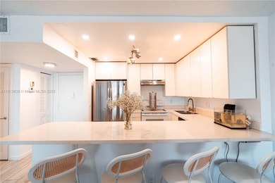 MOTIVATED SELLER! Beautifully updated high-floor 1BD/1.5BA condo