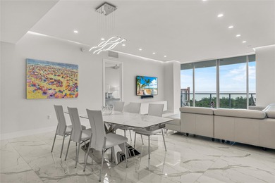 Experience elevated waterfront living in this rarely available