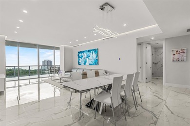 Experience elevated waterfront living in this rarely available