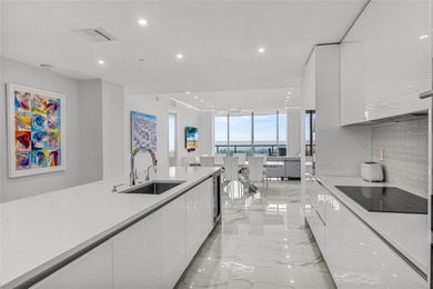 Experience elevated waterfront living in this rarely available