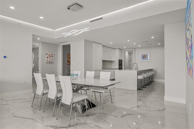 Experience elevated waterfront living in this rarely available