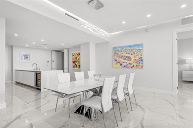 Experience elevated waterfront living in this rarely available