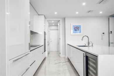 Experience elevated waterfront living in this rarely available