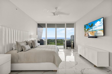 Experience elevated waterfront living in this rarely available