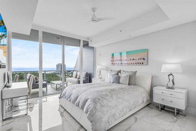 Experience elevated waterfront living in this rarely available