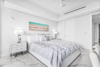 Experience elevated waterfront living in this rarely available