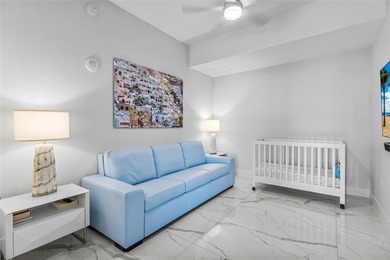 Experience elevated waterfront living in this rarely available