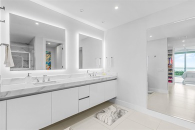 Experience elevated waterfront living in this rarely available