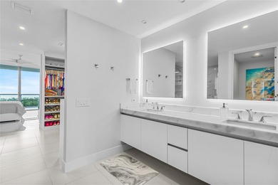 Experience elevated waterfront living in this rarely available