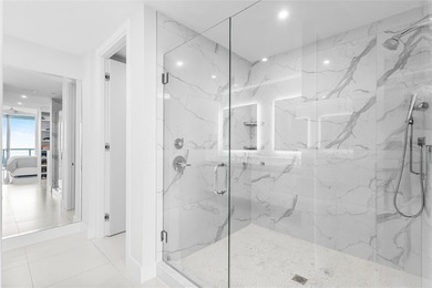 Experience elevated waterfront living in this rarely available