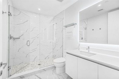 Experience elevated waterfront living in this rarely available