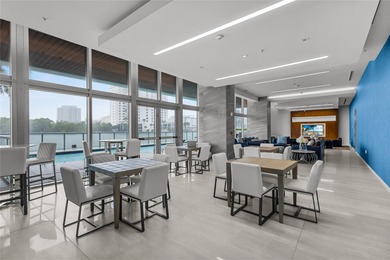 Experience elevated waterfront living in this rarely available