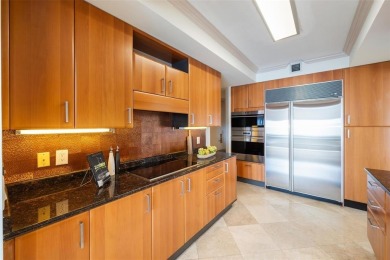 Welcome to the highest 2-bedroom unit in The Palms! Perched on