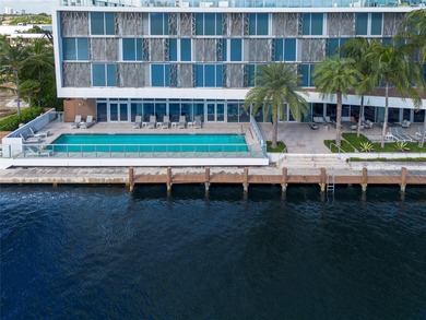 Experience elevated waterfront living in this rarely available