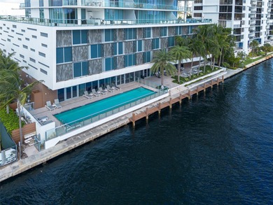 Experience elevated waterfront living in this rarely available