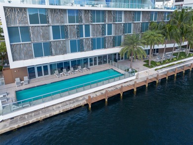 Experience elevated waterfront living in this rarely available