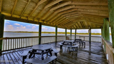 Nestled in the heart of Ponce Inlet, this luxurious condo
